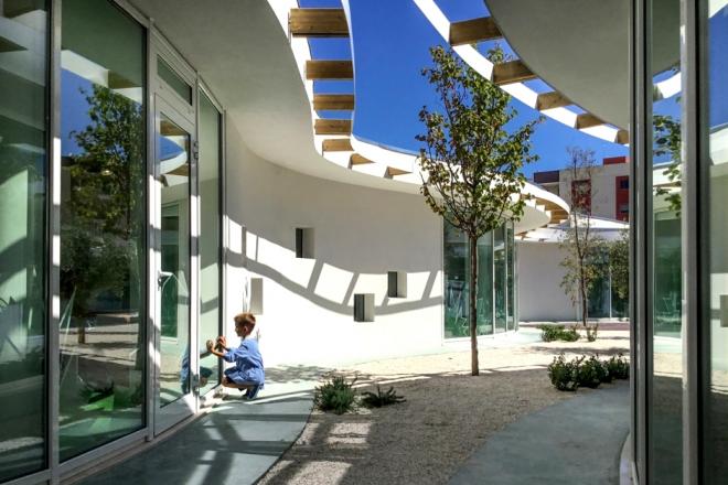 Luca Peralta Studio, 3TI Progetti, projekt przedszkola, realizacje architektoniczne, terra madre